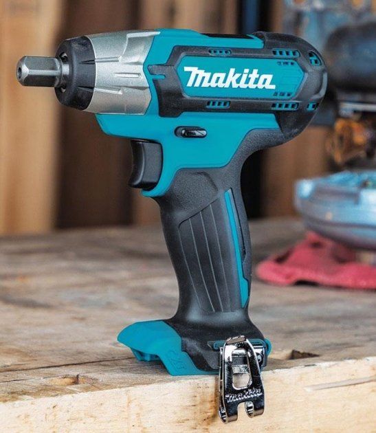 Гайковерт ударний Makita TW141DWME, акумуляторний, 10.8В, 4.0 Аг х 2, CXT, 0-2600 об/хв, 145Нм, 1.2 кг, заряд. пристрій, кейс