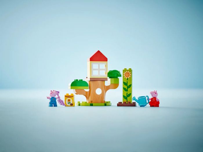 Конструктор LEGO DUPLO Peppa Pig Сад і будиночок на дереві Пеппи