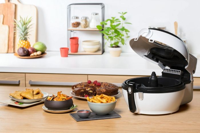 Мультипіч Tefal ActiFry Genius, 1350Вт, чаша-1,2л, сенсорне керув., підкл. до смартфону, авто перемішування, пластик, білий