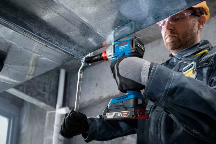 Набір із трьох акумуляторних інструментів Bosch Professional дриль-шурупокрут GSR 18V-65, перфоратор GBH 18V-22, гайковерт ударний GDX 18V-285 акб 3x5А·год, ЗП, сумка M-BAG