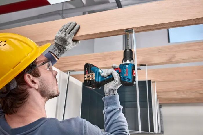 Набір із трьох акумуляторних інструментів Bosch Professional дриль-шурупокрут GSR 18V-65, перфоратор GBH 18V-22, гайковерт ударний GDX 18V-285 акб 3x5А·год, ЗП, сумка M-BAG