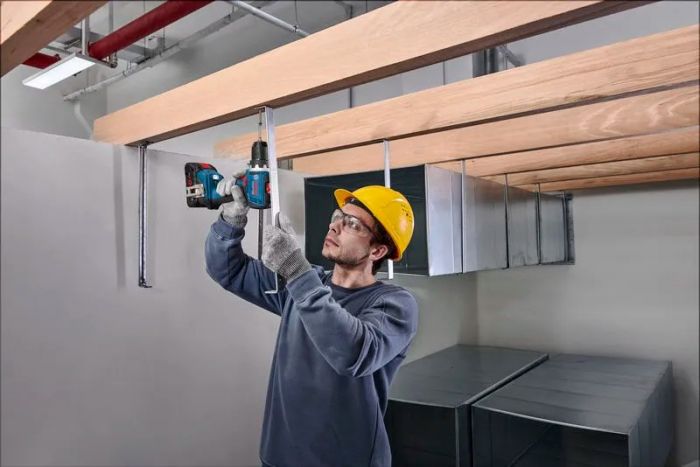 Набір із трьох акумуляторних інструментів Bosch Professional дриль-шурупокрут GSR 18V-65, перфоратор GBH 18V-22, гайковерт ударний GDX 18V-285 акб 3x5А·год, ЗП, сумка M-BAG
