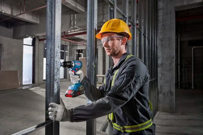 Набір із трьох акумуляторних інструментів Bosch Professional дриль-шурупокрут GSR 18V-65, перфоратор GBH 18V-22, гайковерт ударний GDX 18V-285 акб 3x5А·год, ЗП, сумка M-BAG