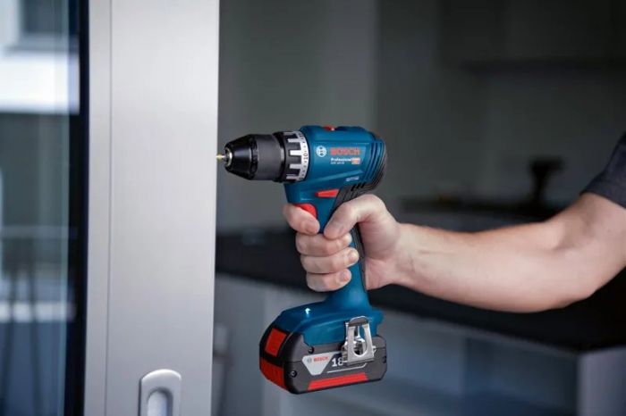 Набір із трьох акумуляторних інструментів Bosch Professional дриль-шурупокрут GSR 18V-45, перфоратор GBH 18V-22, Шліфмашина кутова GWS 18V-8 акб 3x4А·год, ЗП, сумка M-BAG